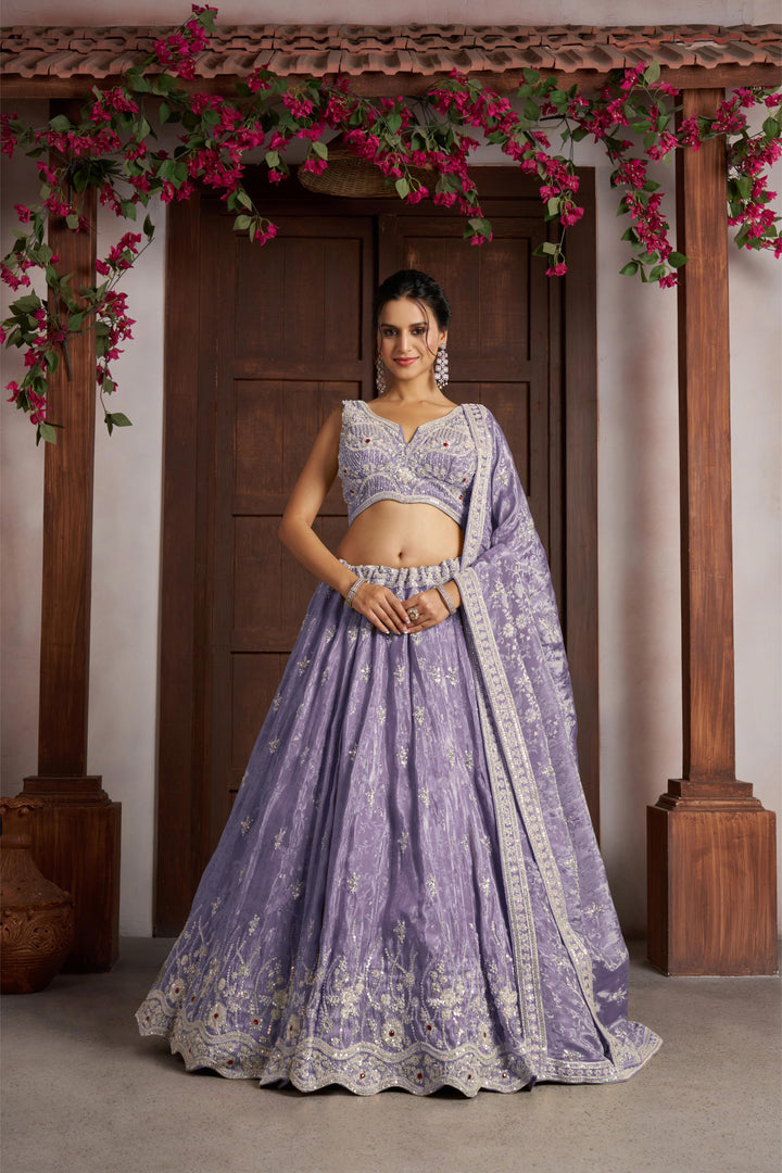 Luxurious Purple Banarasi Tissue Lehenga Adorned with Bead Embellishments | SHOBITAM
