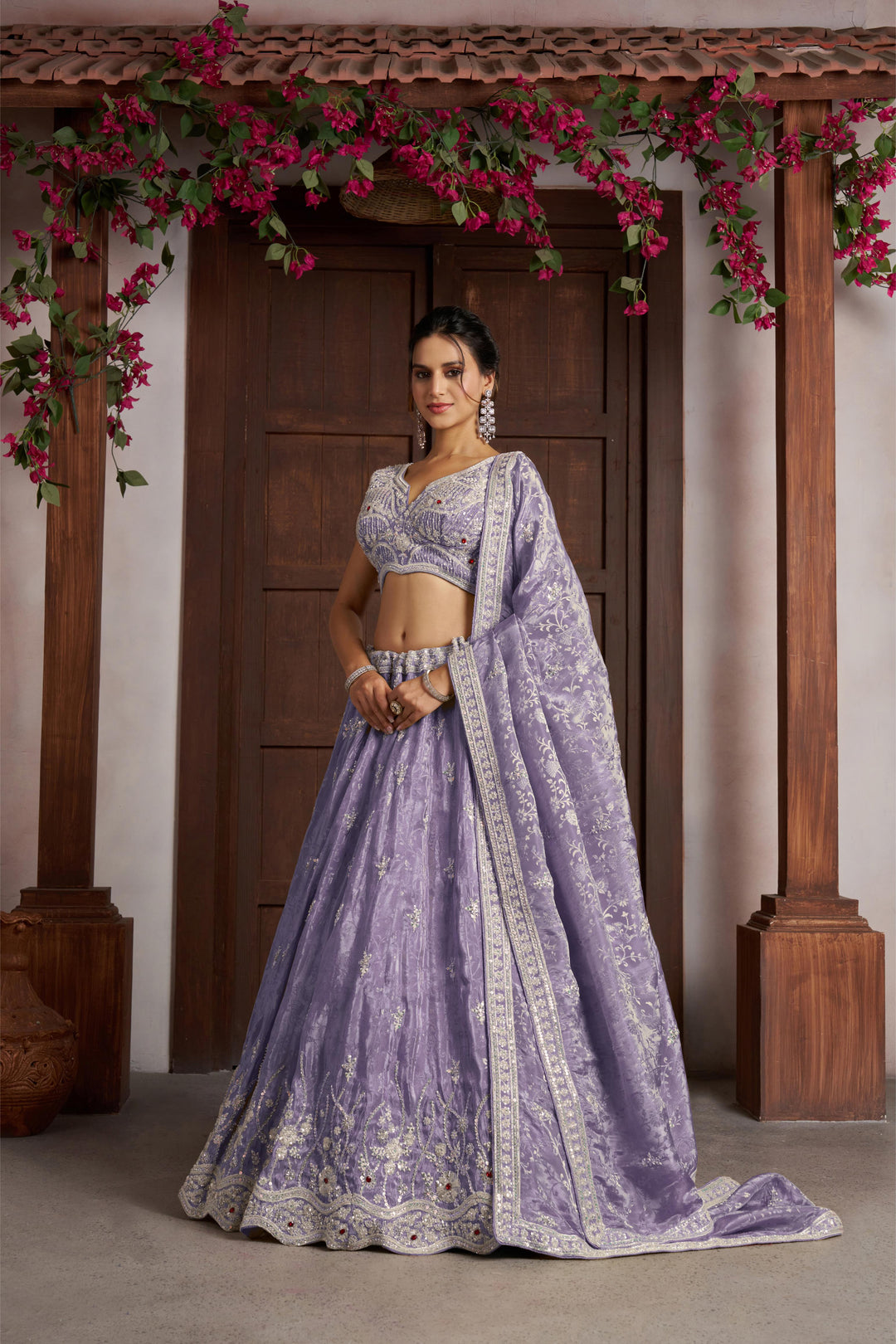 Luxurious Purple Banarasi Tissue Lehenga Adorned with Bead Embellishments | SHOBITAM