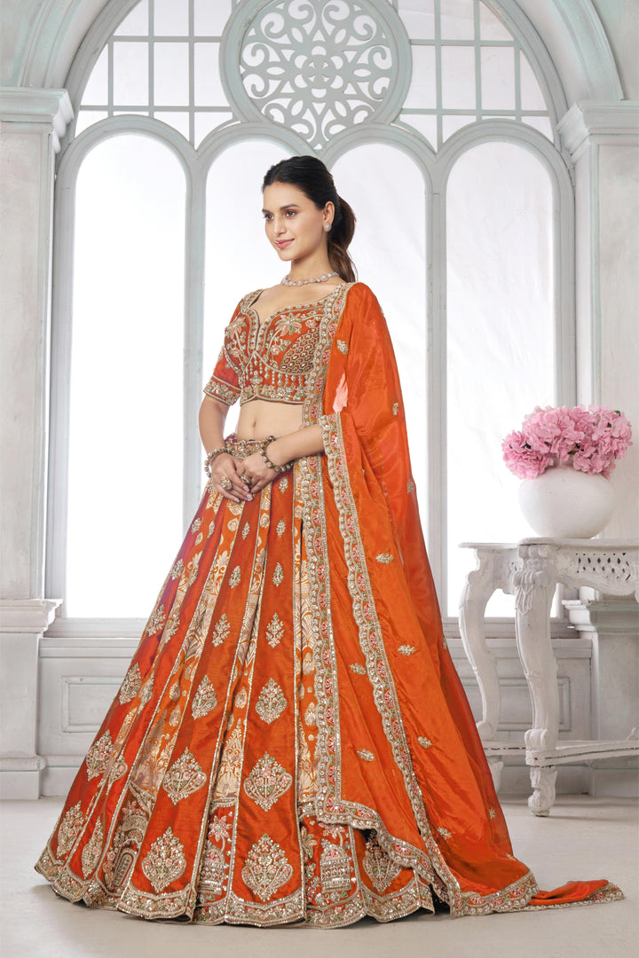Elegant Rust Lehenga Featuring Rich Raw Silk and Artisan Craftsmanship | SHOBITAM