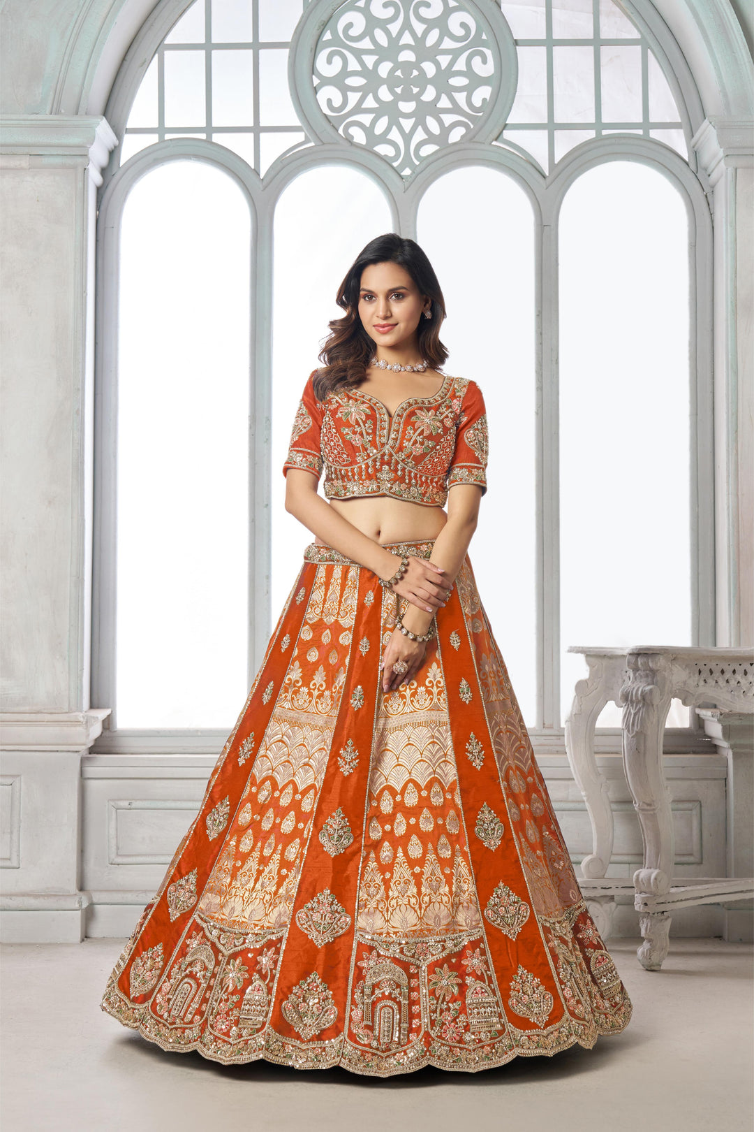 Elegant Rust Lehenga Featuring Rich Raw Silk and Artisan Craftsmanship | SHOBITAM