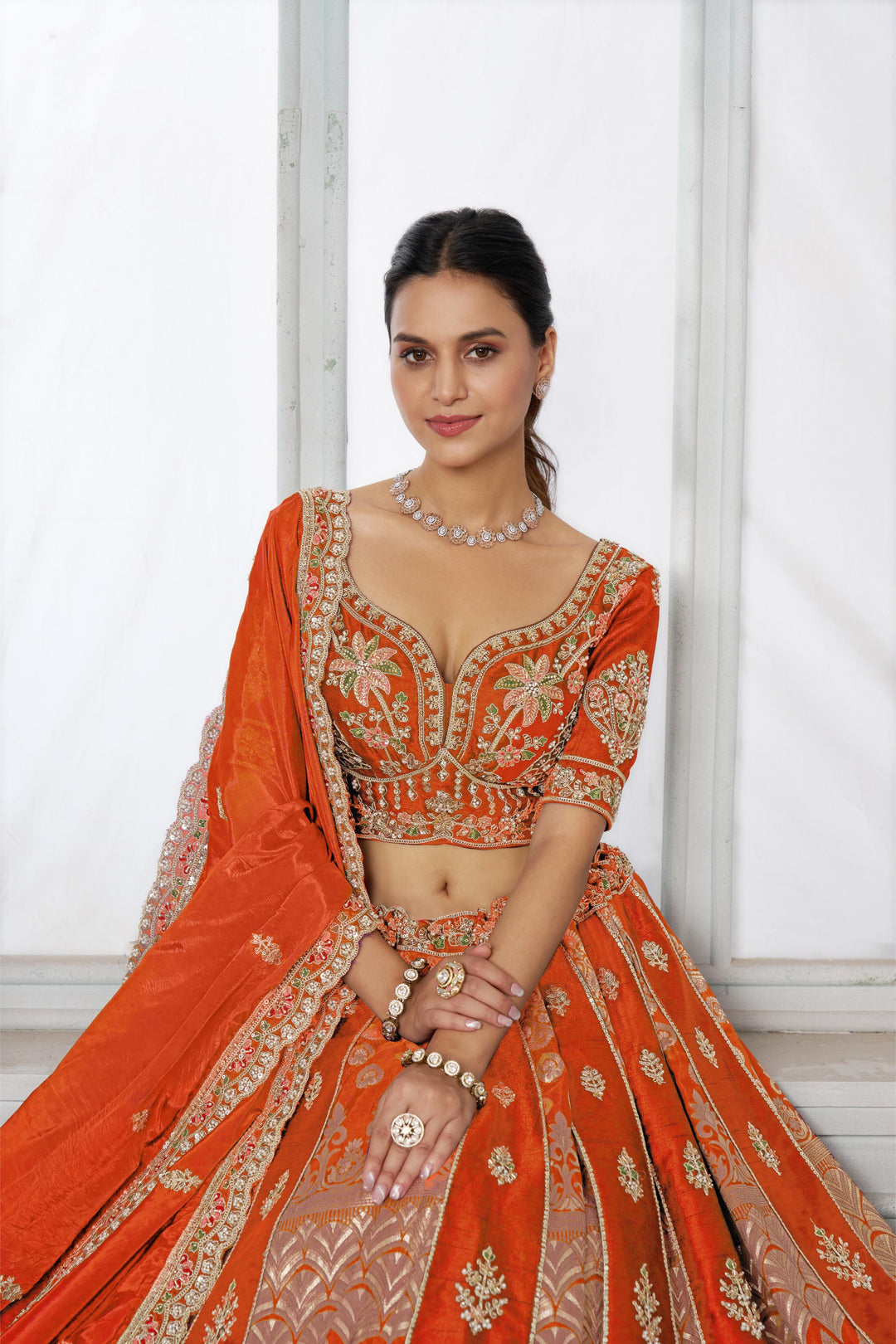 Elegant Rust Lehenga Featuring Rich Raw Silk and Artisan Craftsmanship | SHOBITAM