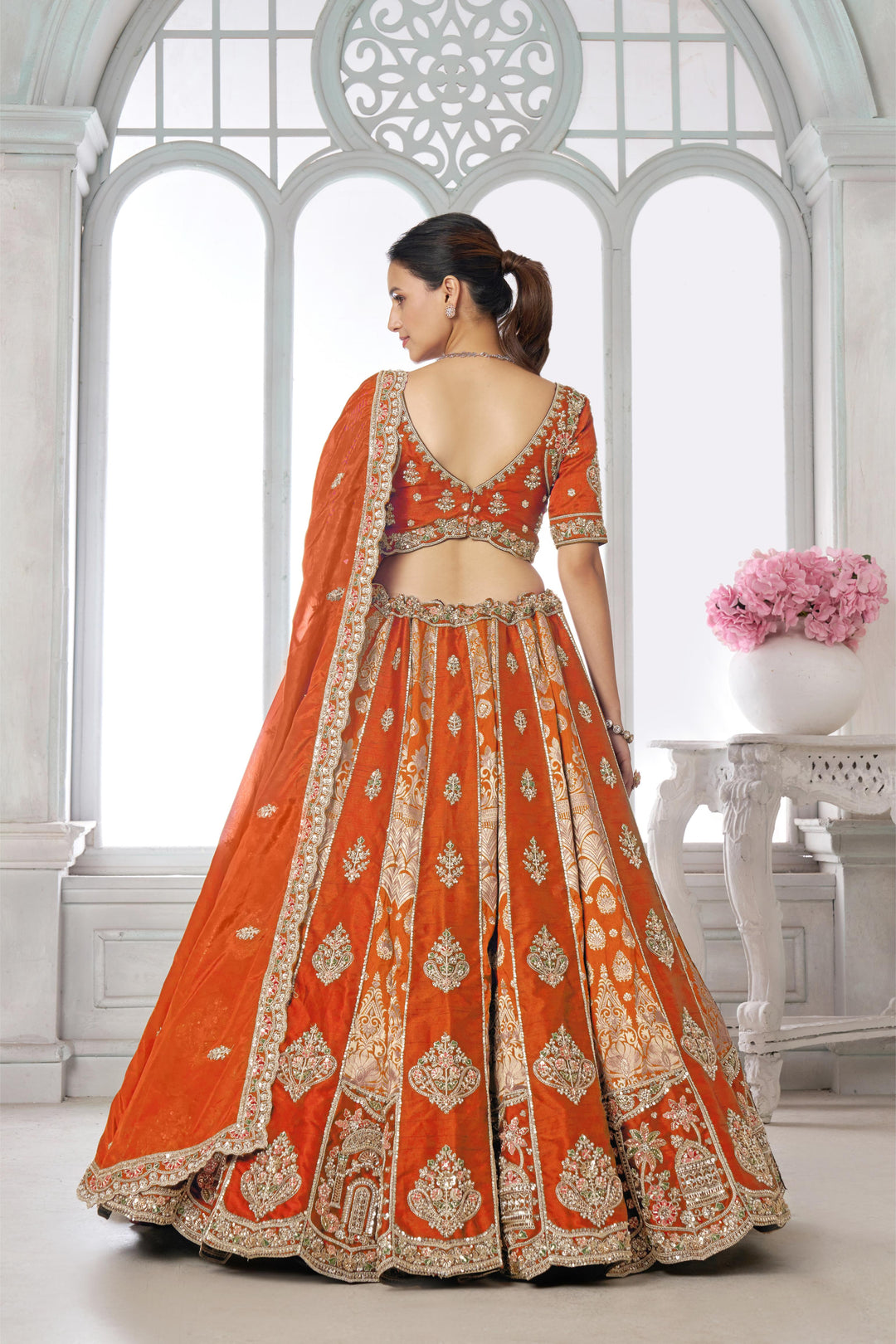Elegant Rust Lehenga Featuring Rich Raw Silk and Artisan Craftsmanship | SHOBITAM