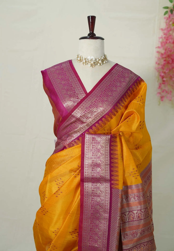 Turmeric Yellow And Pink Semi Silk Saree with Zari detailing | SHOBITAM