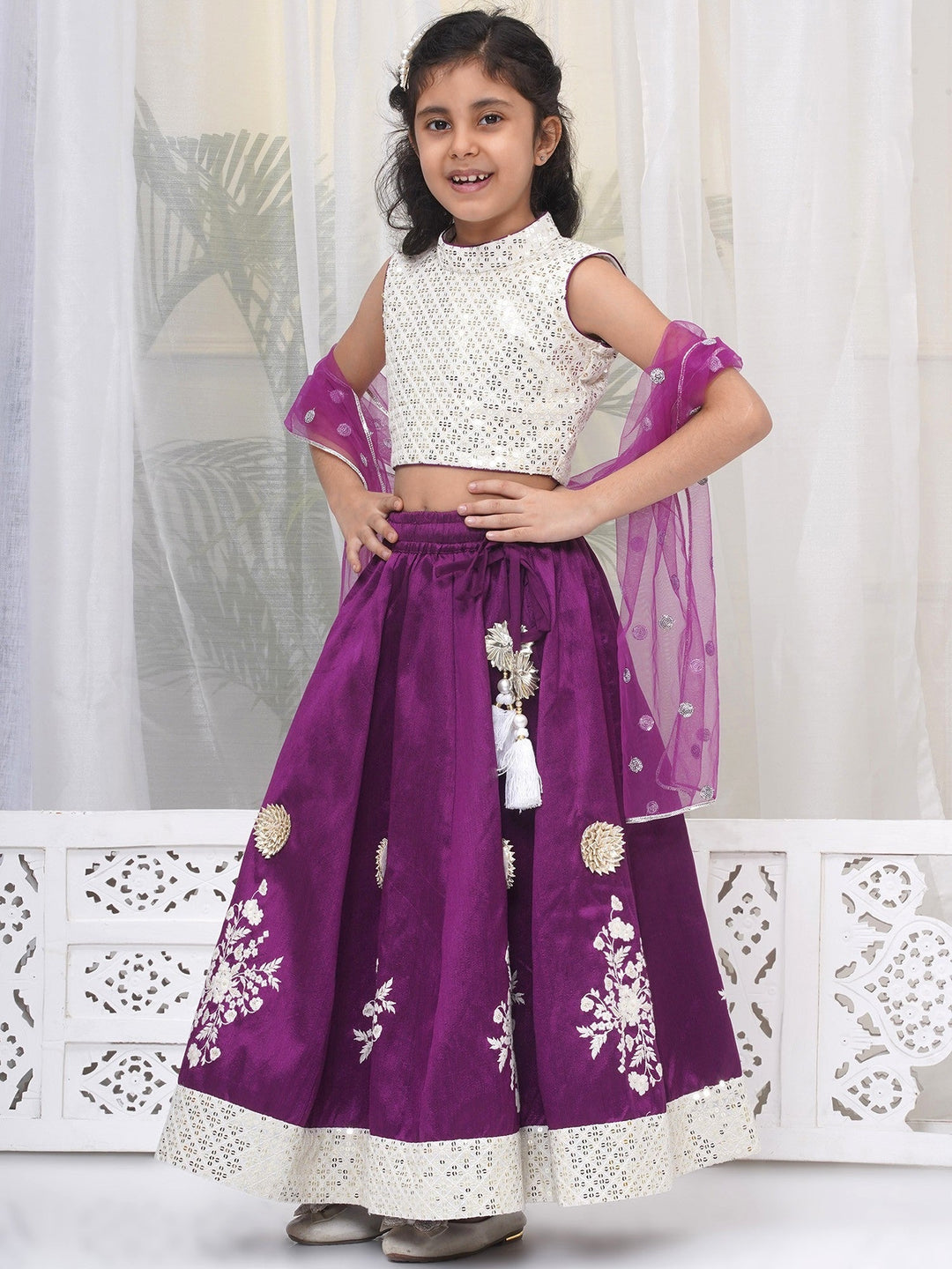 Girls Silk Brocade Kali Work Lehenga with Floral Thread Work & Sequin work Sleeveless Blouse with Dupatta - Purple | SHOBITAM
