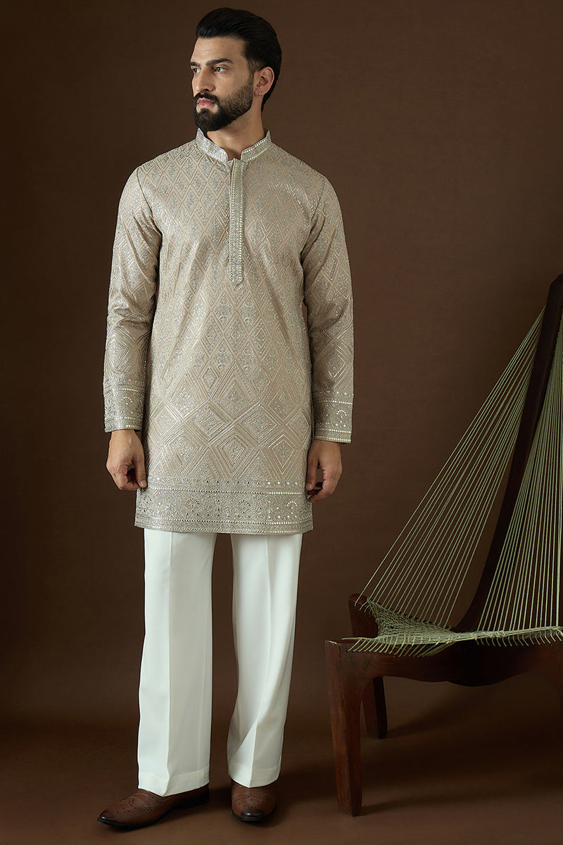 Beige Gerogrtte Solid Embroidered Straight Kurta | SHOBITAM