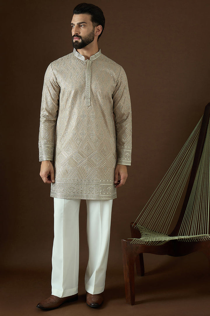 Beige Gerogrtte Solid Embroidered Straight Kurta | SHOBITAM