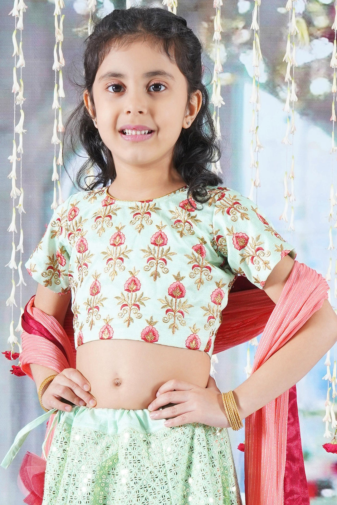 Girl Bageecha Floral Thread work Blouse with Mirror work Lehenga and Sequin moti work Dupatta, accompanied with Hand made tassel and Ghungroo work | SHOBITAM