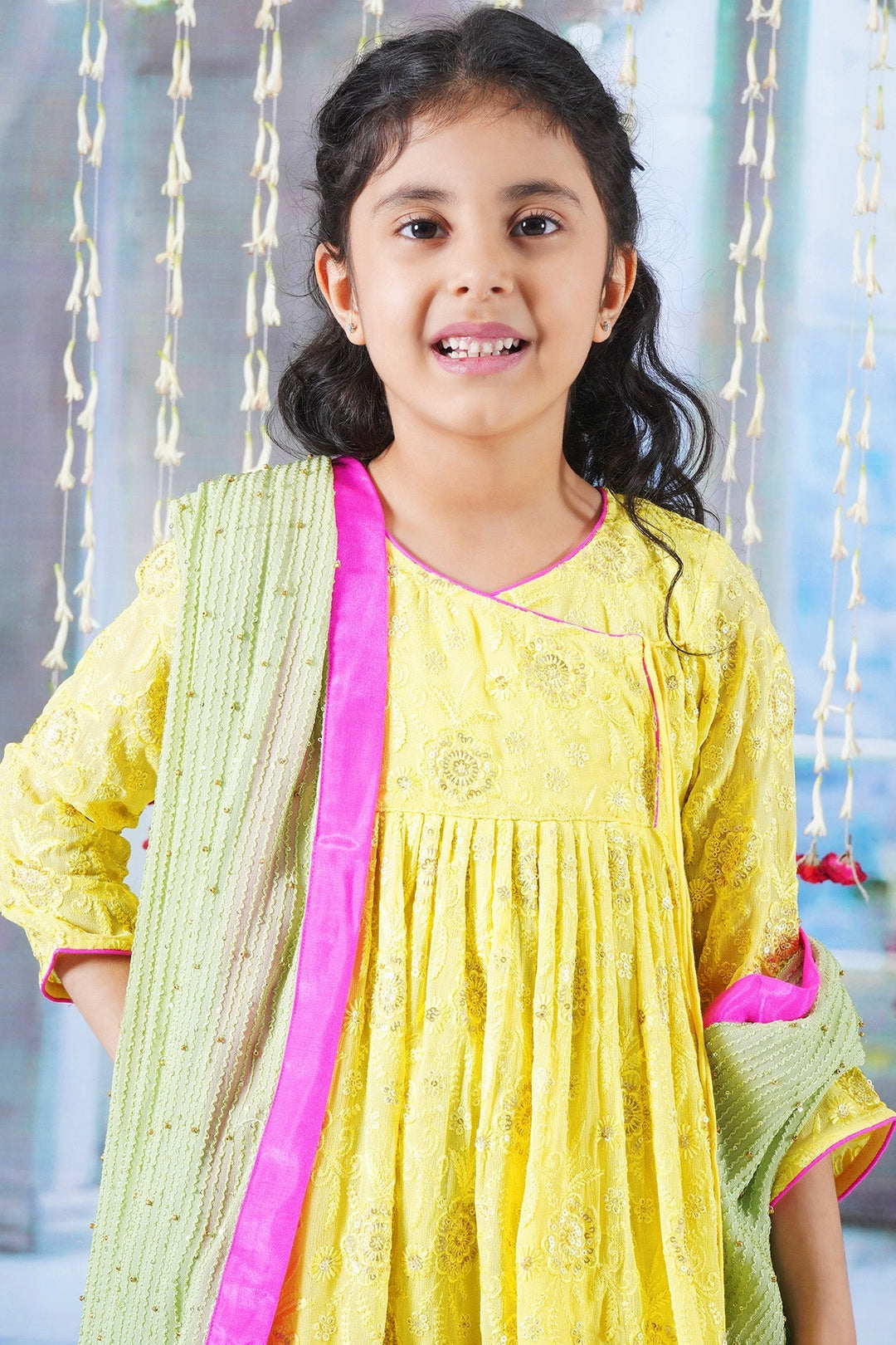Girls Floral Embrodiery Angrakha Kurta with Sharara, Dupatta and Hand made Potli with Ghungroo work Tassel | SHOBITAM