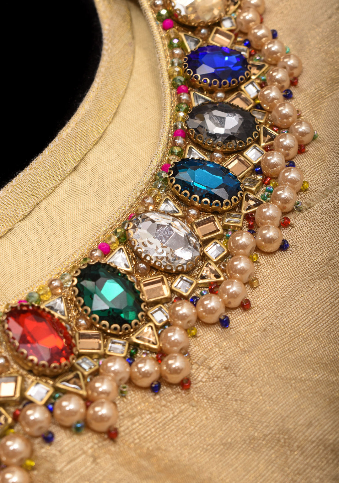 Multicolor Necklace and bajuband handwork detailing on Sandal Pure Tissue Raw Silk Blouse