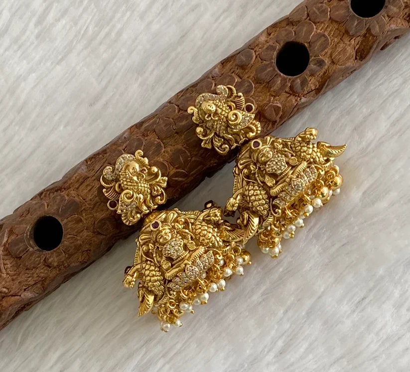 Antique Gold tone Nakshi Peacock Lakshmi Jhumka | SHOBITAM