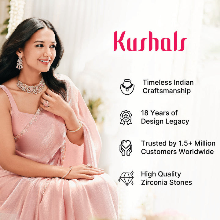 Elegant Jhumka Earrings with Sparkling Zircons, Green Gemstones, and Pearl Drops