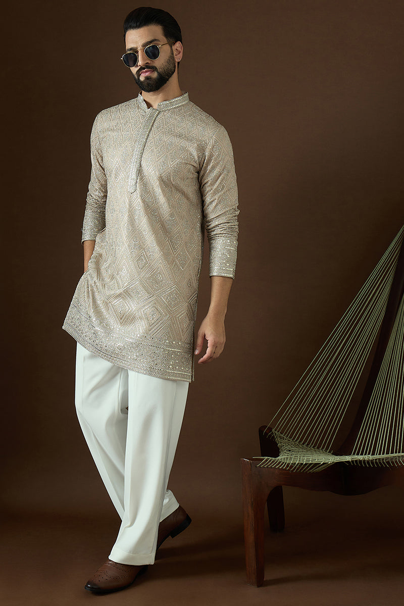 Beige Gerogrtte Solid Embroidered Straight Kurta | SHOBITAM