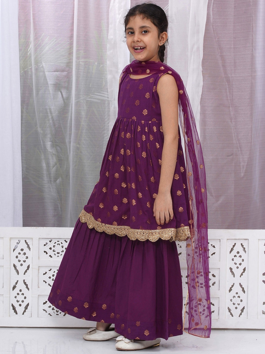 Girls Cotton Sleeveless Frock Style Kurta with Sharara and Dupatta with Golden Floral Zari Work - Purple| SHOBITAM