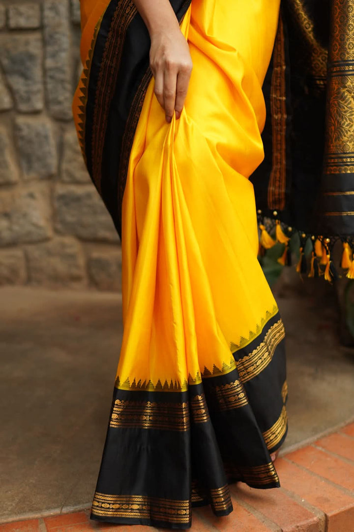 Yellow Exquisite Korvai Gadwal Silk Saree with Black  Borders | SILK MARK CERTIFIED