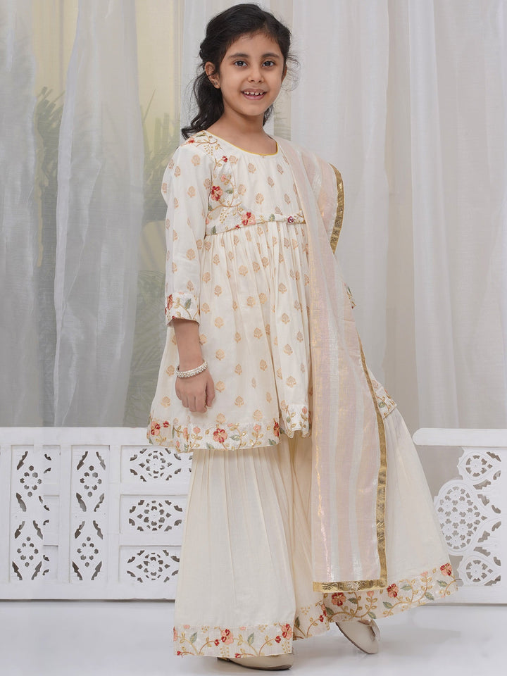 Girls Cotton Three Fourth Sleeves Frock Kurta with Sharara and Dupatta with Floral Embroidery & Zari Work - Cream | SHOBITAM