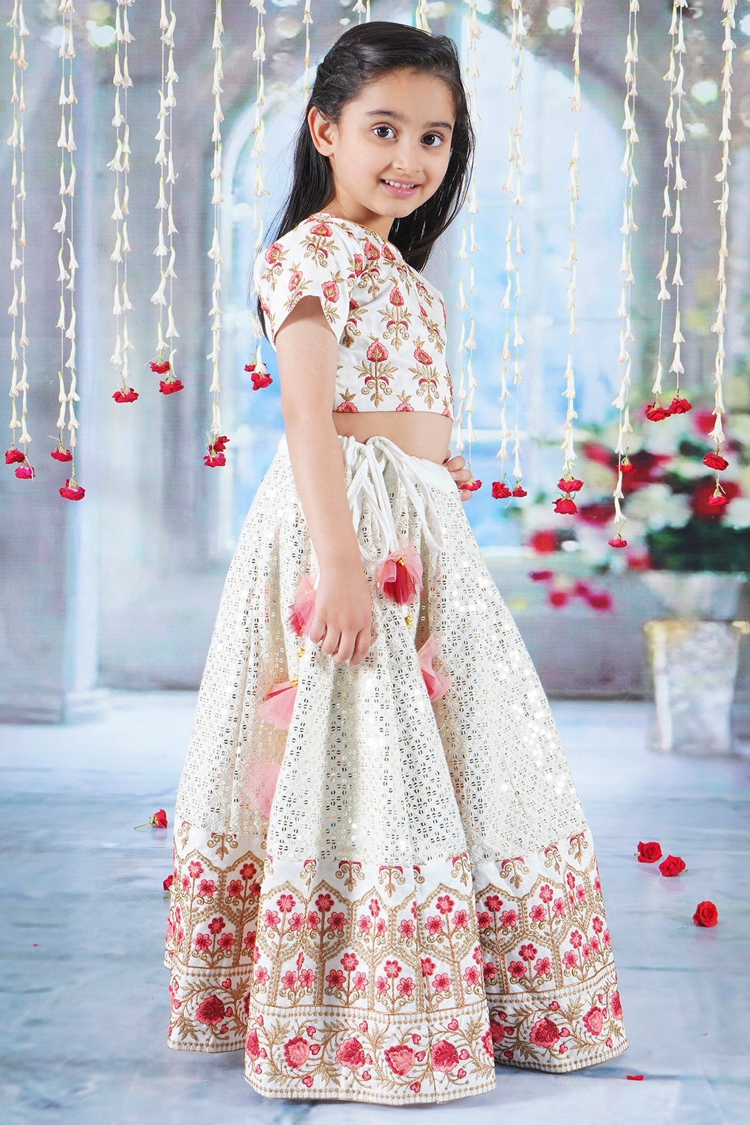 Girl Bageecha Floral Thread work Blouse with Mirror work Lehenga and Sequin moti work Dupatta, accompanied with Hand made tassel and Ghungroo work | SHOBITAM