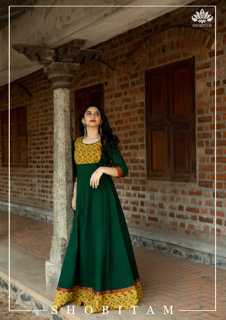 Saniya Emerald Green Kanchi Cotton Long Dress with Yellow Ajrakh Detailing | Shobitam Custom Gowns | Made To Order