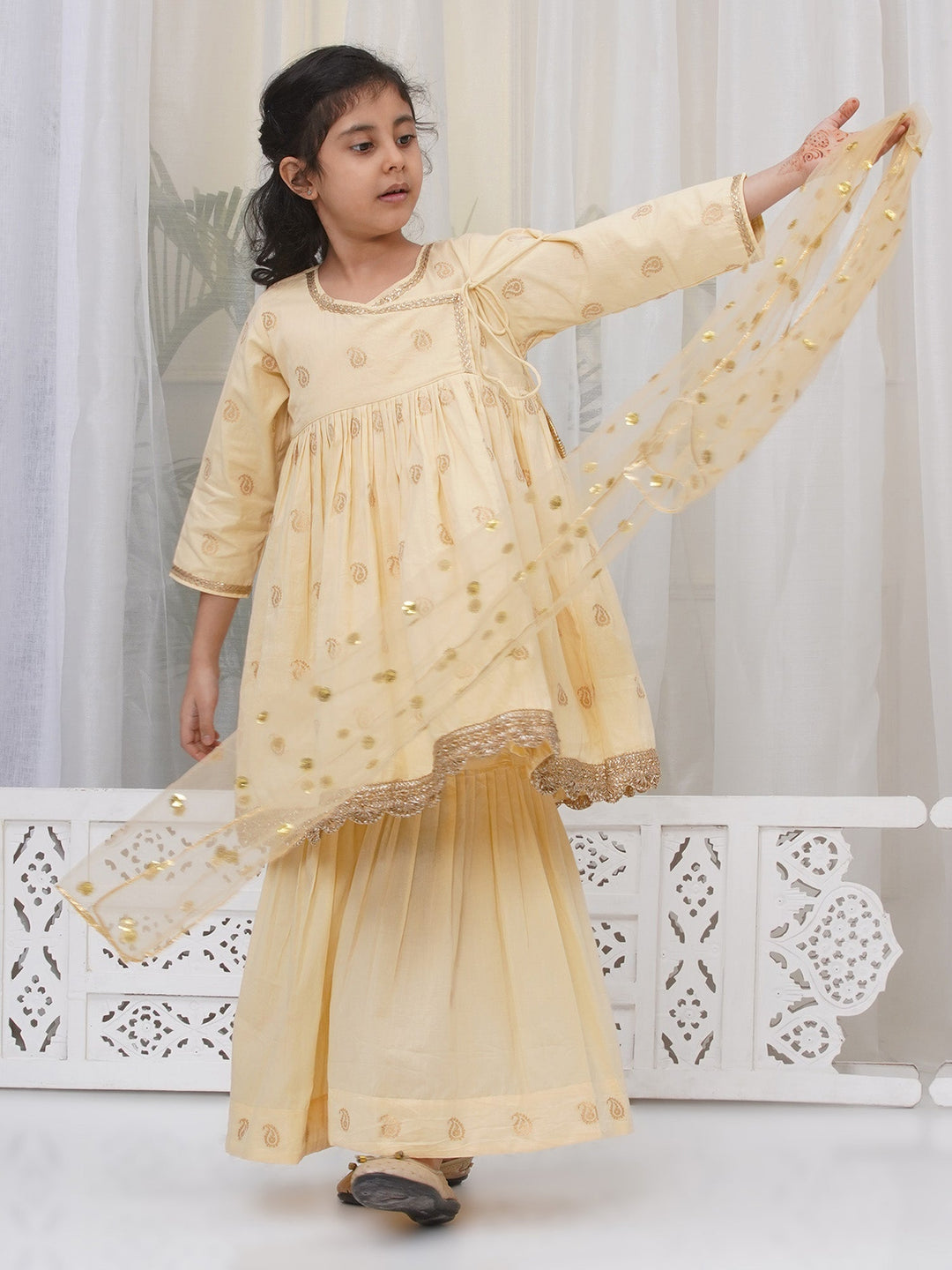 Girls Cotton Three Fourth Sleeves Angrakha Kurta with Sharara and Net Dupatta with Paisley Design Zari Work- Dutch Cream | SHOBITAM