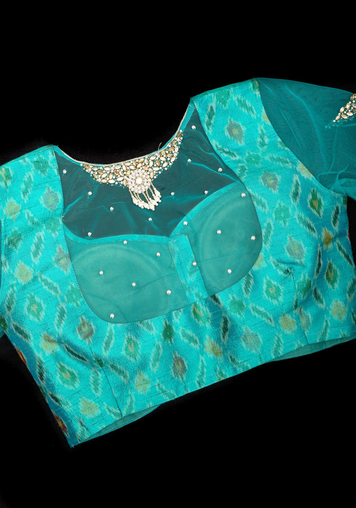Cyan Pure ikkat  Raw silk blouse with Rhinestone detailing in back and sleeves