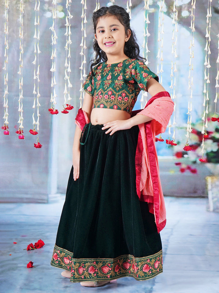 Girl Bageecha Floral Thread work Blouse with Velvet Lehenga and Sequin moti work Dupatta, accompanied with Hand made tassel and Ghungroo work in Green | SHOBITAM
