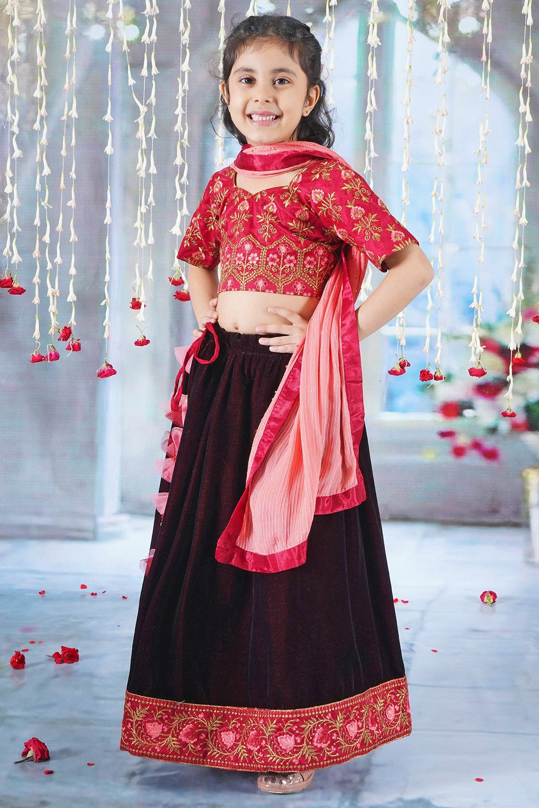 Girl Bageecha Floral Thread work Blouse with Velvet Lehenga and Sequin moti work Dupatta, accompanied with Hand made tassel and Ghungroo work in Cherry Red | SHOBITAM