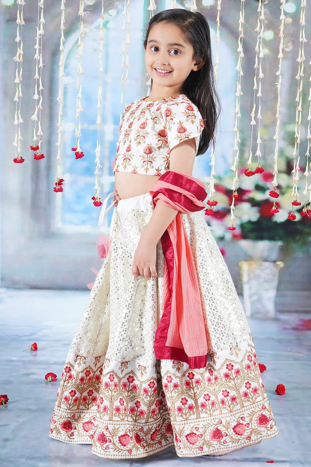 Girl Bageecha Floral Thread work Blouse with Mirror work Lehenga and Sequin moti work Dupatta, accompanied with Hand made tassel and Ghungroo work | SHOBITAM