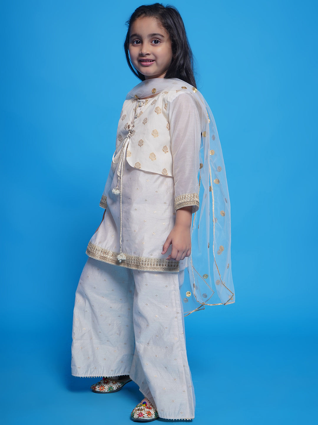 Girls Chanderi Cotton Three Fourth Sleeves Kurta with Attached Floral Jacket and Plazzo with Dupatta Adorned by Lace & Tussel work - Cream | SHOBITAM
