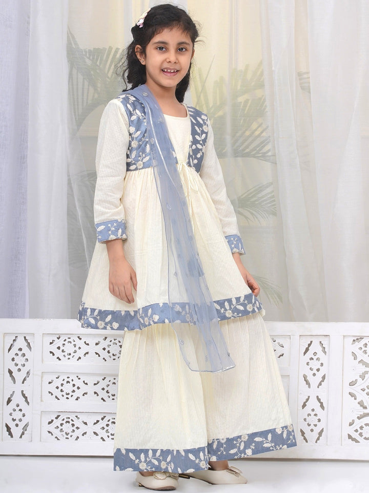 Girls Cotton Three Fourth Sleeves Frock Style Kurta with Sharara and Dupatta with Floral Thread Embroidery & Tussel Work - Cream | SHOBITAM