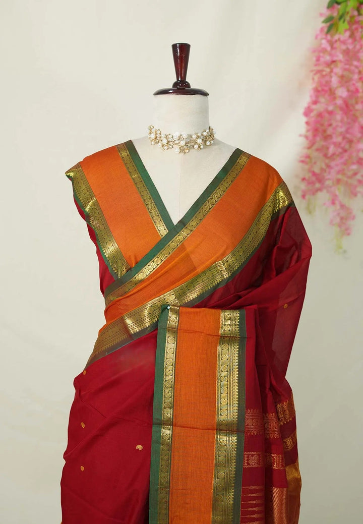 Maroon Pure mercerized silk cotton with buttas and rettapet border | SHOBITAM