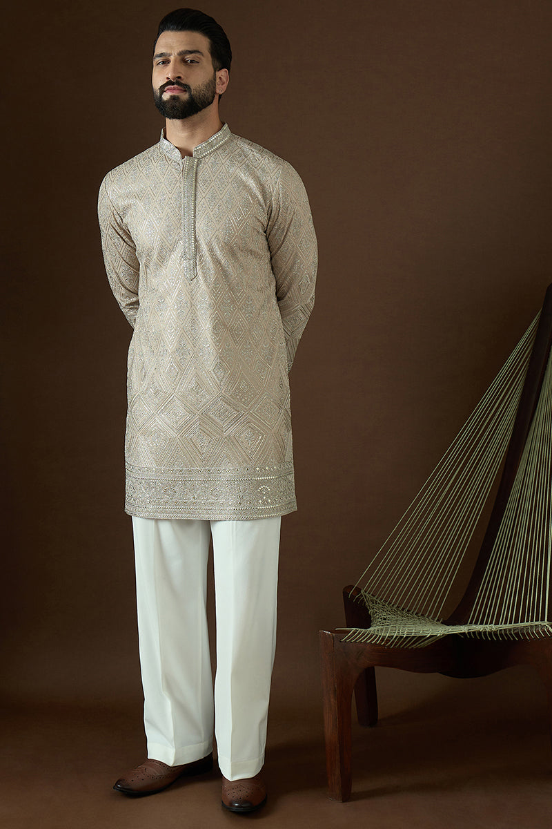 Beige Gerogrtte Solid Embroidered Straight Kurta | SHOBITAM
