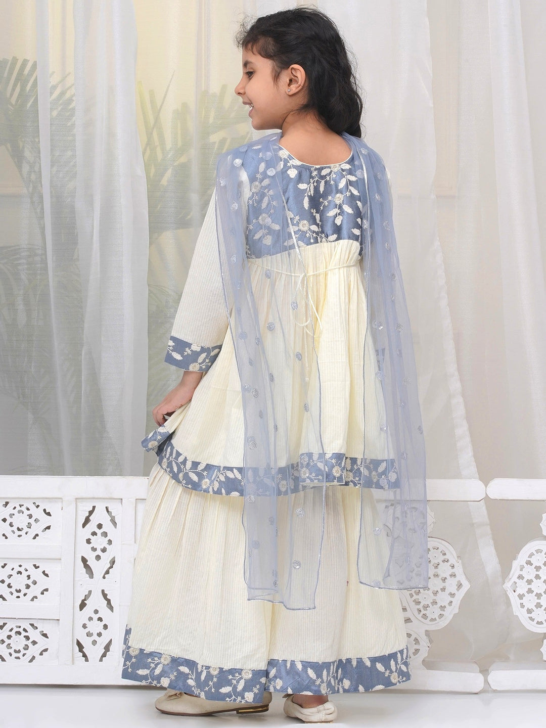 Girls Cotton Three Fourth Sleeves Frock Style Kurta with Sharara and Dupatta with Floral Thread Embroidery & Tussel Work - Cream | SHOBITAM
