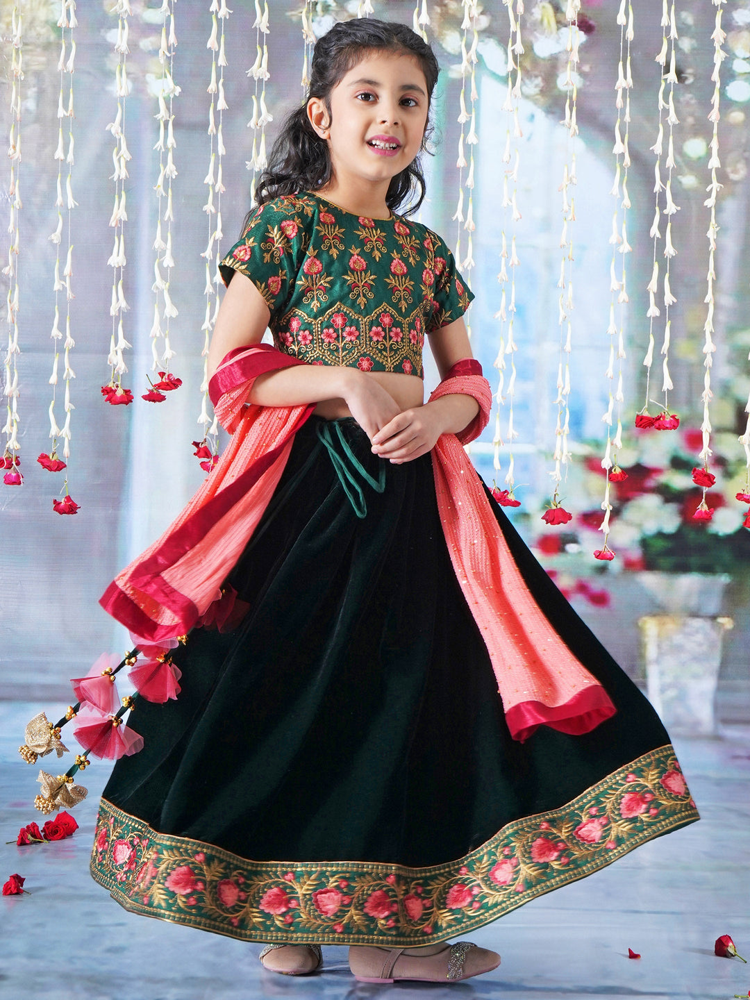Girl Bageecha Floral Thread work Blouse with Velvet Lehenga and Sequin moti work Dupatta, accompanied with Hand made tassel and Ghungroo work in Green | SHOBITAM