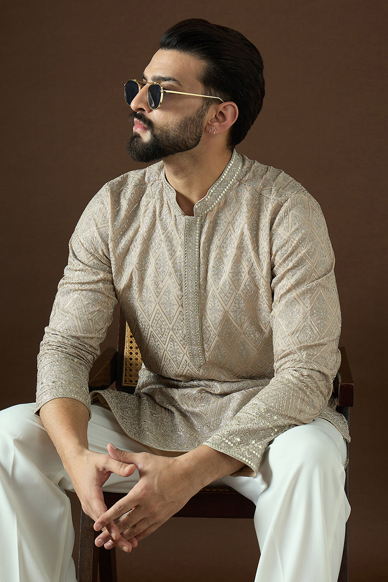 Beige Gerogrtte Solid Embroidered Straight Kurta | SHOBITAM