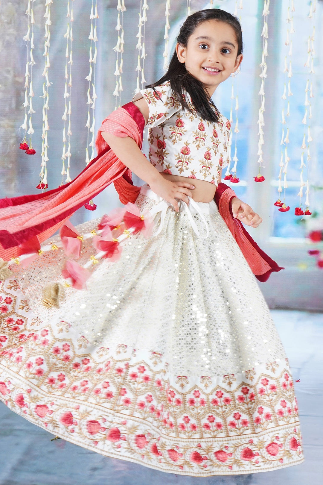 Girl Bageecha Floral Thread work Blouse with Mirror work Lehenga and Sequin moti work Dupatta, accompanied with Hand made tassel and Ghungroo work | SHOBITAM