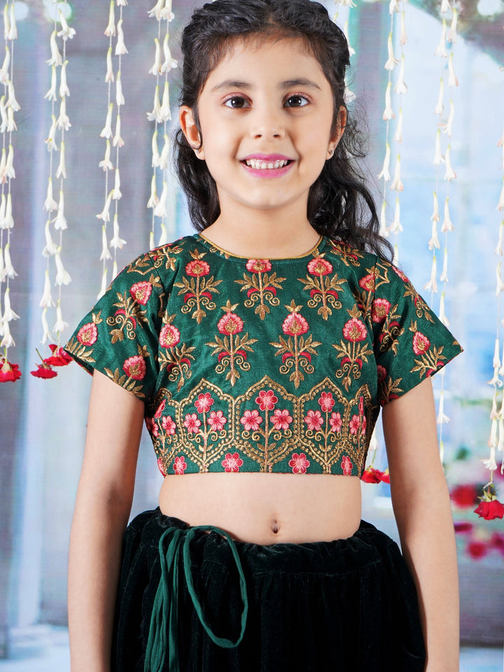 Girl Bageecha Floral Thread work Blouse with Velvet Lehenga and Sequin moti work Dupatta, accompanied with Hand made tassel and Ghungroo work in Green | SHOBITAM