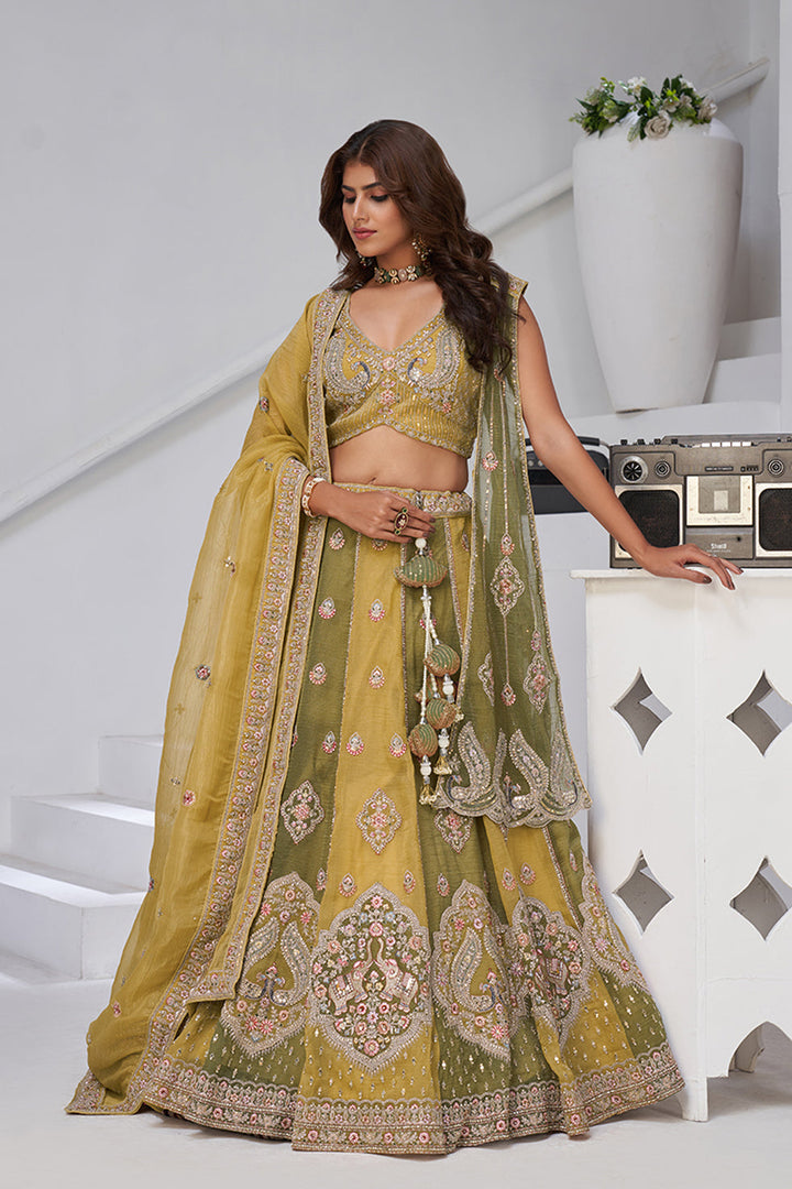 Kanira - Shades of haldi & Mehendi Lehenga Set | SHOBITAM