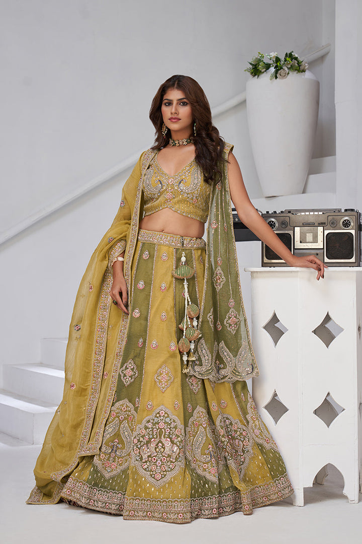 Kanira - Shades of haldi & Mehendi Lehenga Set | SHOBITAM
