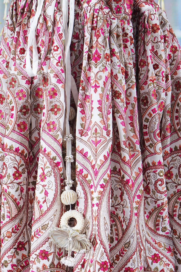 Girls Multi color Mughal Pattern Floral Thread work Cream Lehenga with Blouse and Dupatta with Pearl Detailing and Hand made Tassel | SHOBITAM