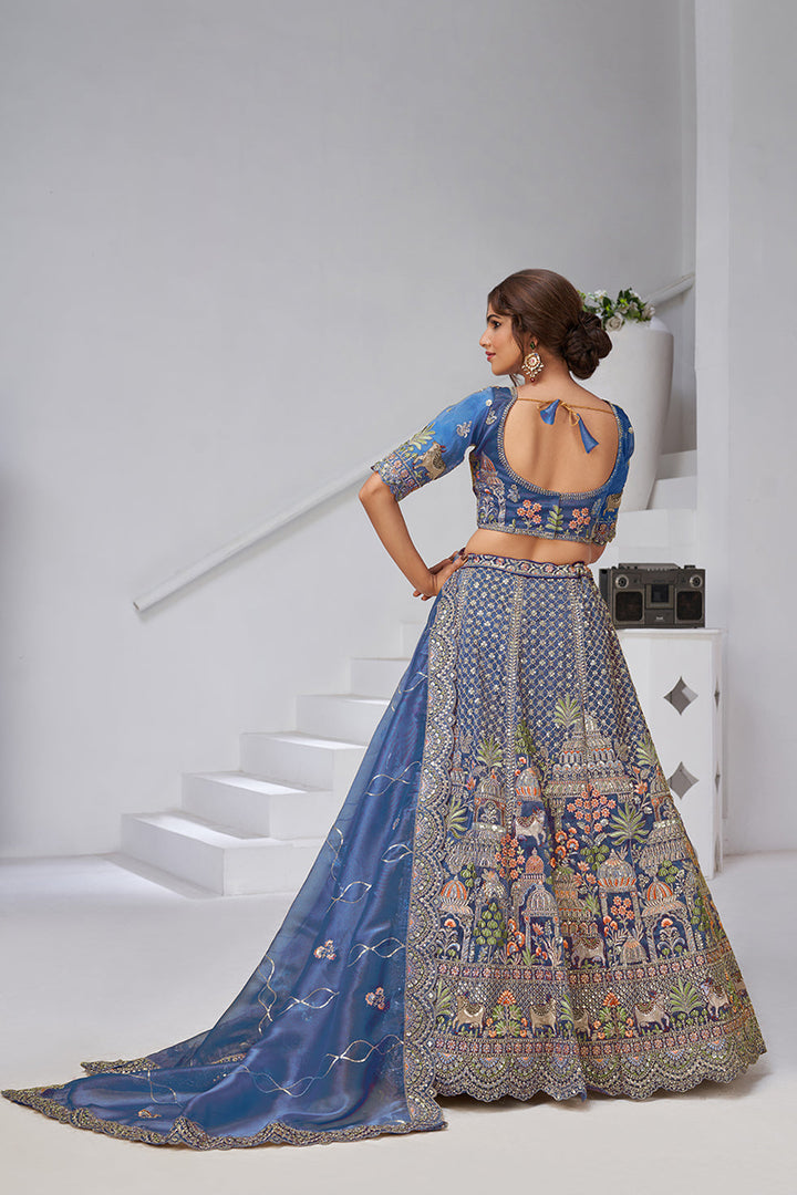 Ishanya Tissue Organza Teal Lehenga | SHOBITAM