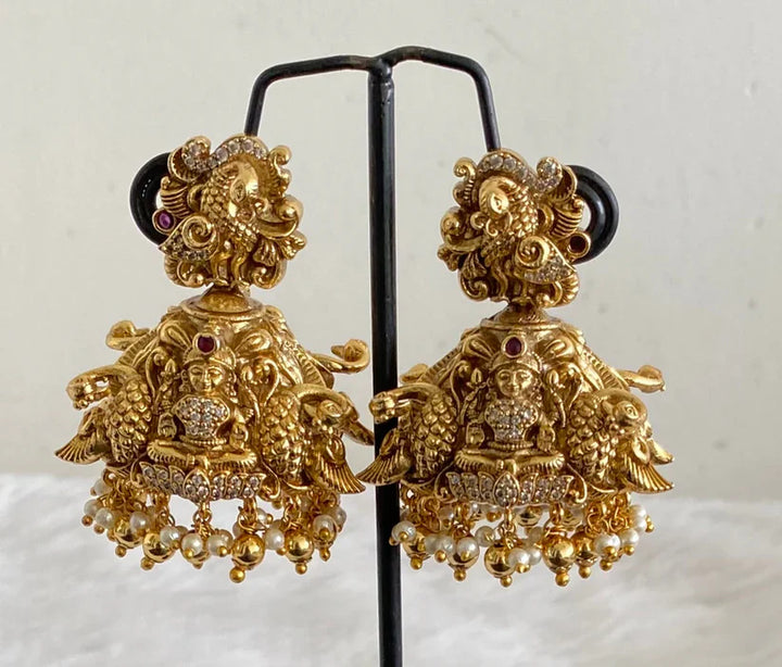 Antique Gold tone Nakshi Peacock Lakshmi Jhumka | SHOBITAM