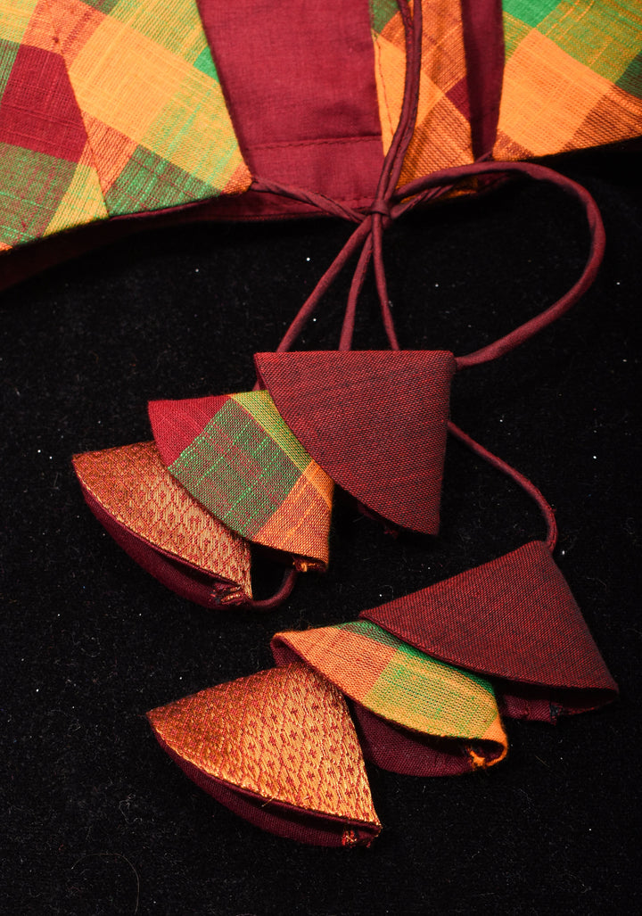 Madras Cotton  checks goblet neck blouse with zari sleeves and tie back