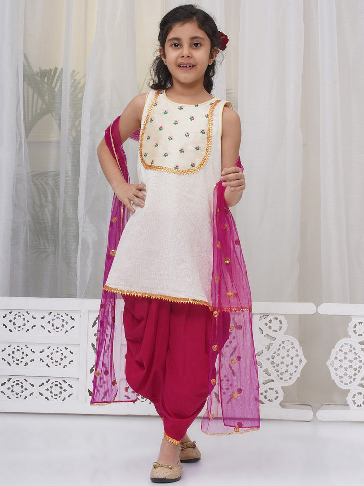 Girls Cotton Sleeveless Kurta with Dhoti Salwar and Dupatta with Floral Embroidery - Cream | SHOBITAM