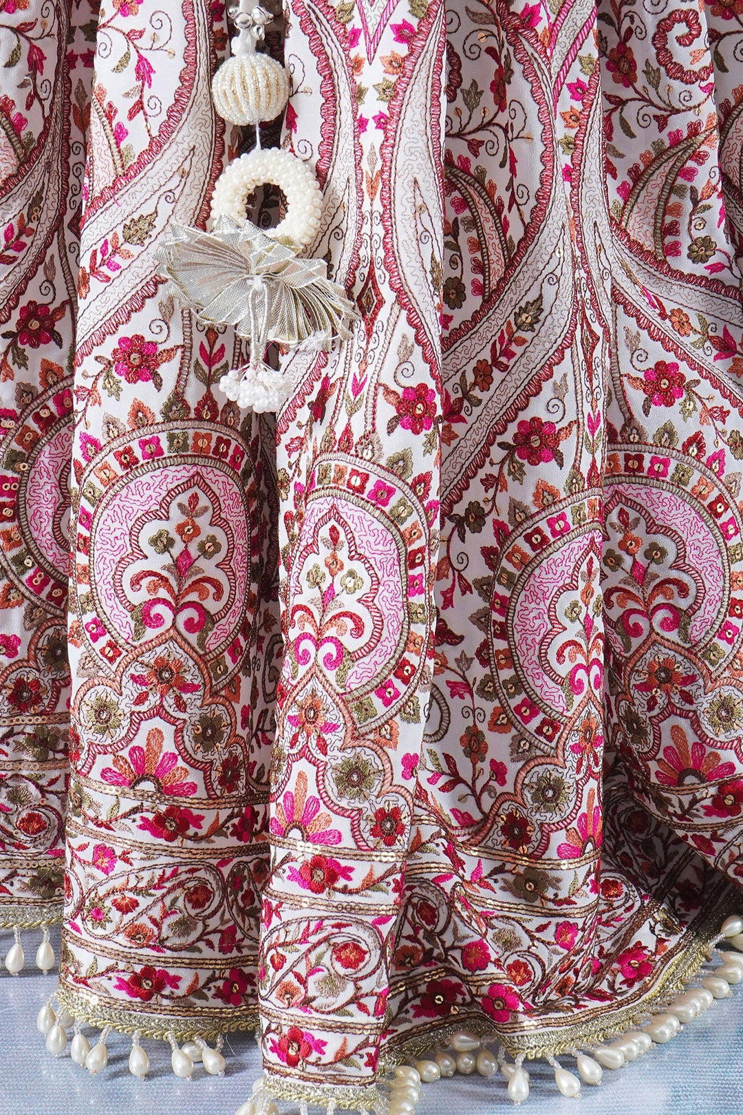 Girls Multi color Mughal Pattern Floral Thread work Cream Lehenga with Blouse and Dupatta with Pearl Detailing and Hand made Tassel | SHOBITAM