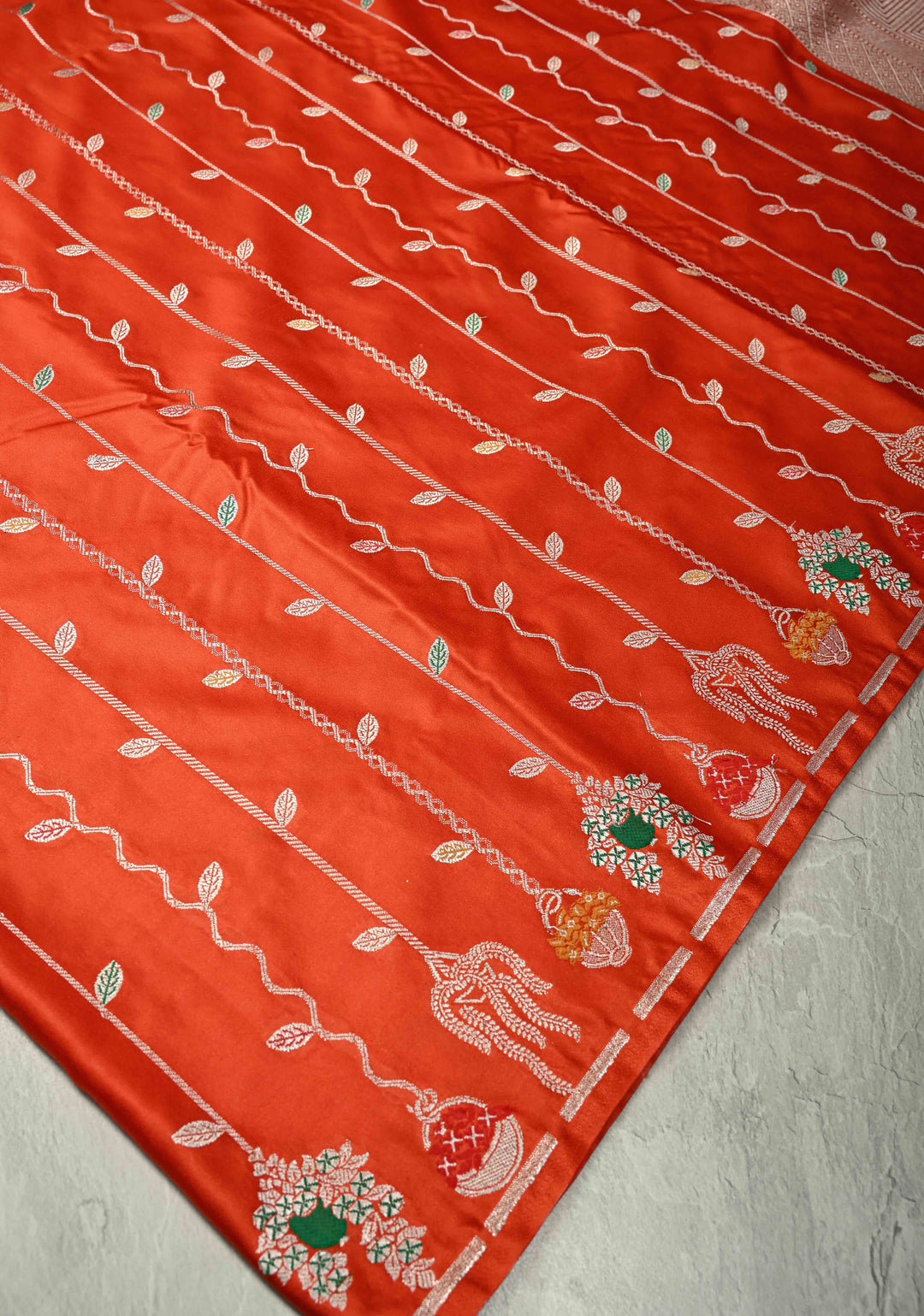Reddish Orange Banarasi Semi Mashru Silk Saree with Meenakari Vertical Ornate Zari Stripes