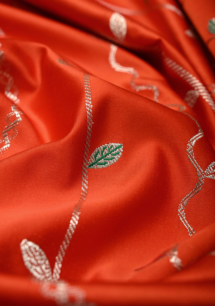 Reddish Orange Banarasi Semi Mashru Silk Saree with Meenakari Vertical Ornate Zari Stripes