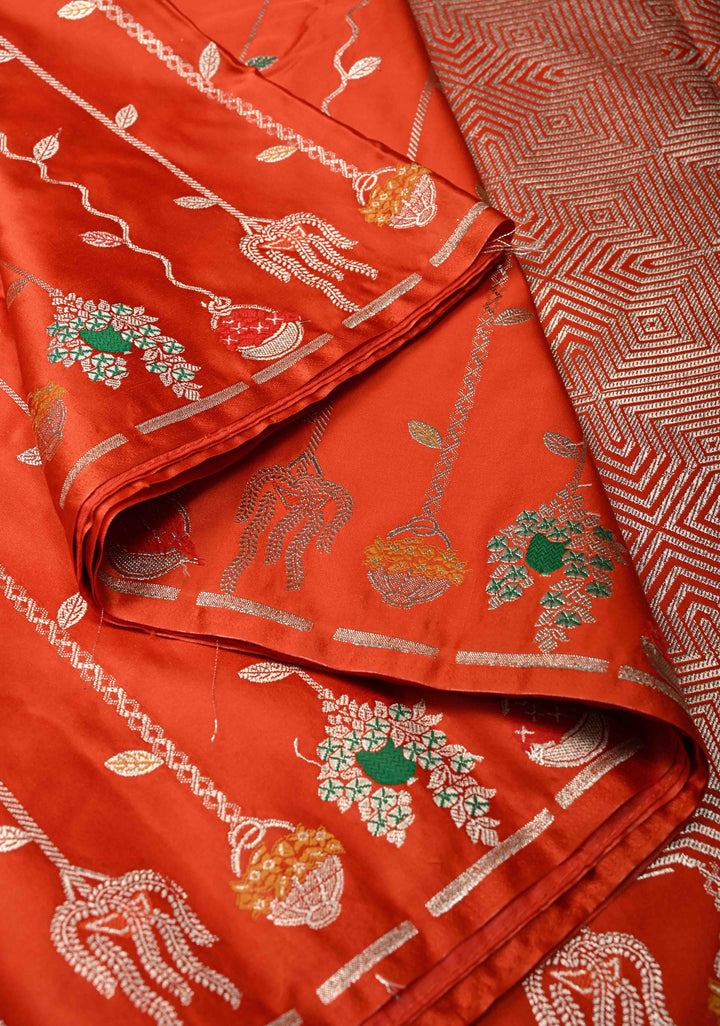 Reddish Orange Banarasi Semi Mashru Silk Saree with Meenakari Vertical Ornate Zari Stripes