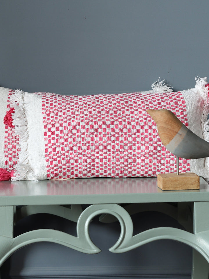 Hand woven cushion cover with tassels and fringes in pink and white