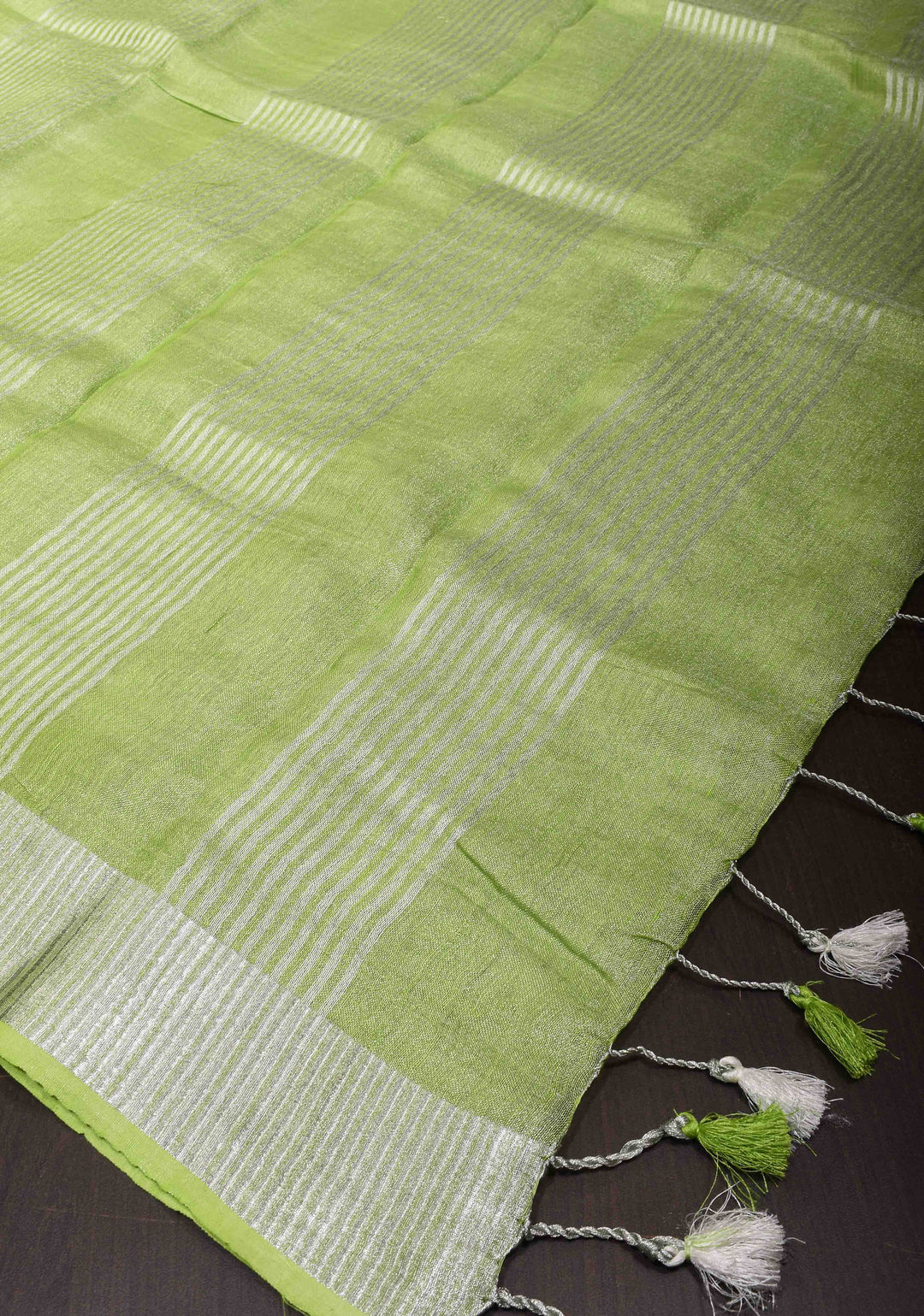 Parrot Green Linen Saree with Parijaat Flower Embroidery  | Shobitam saree