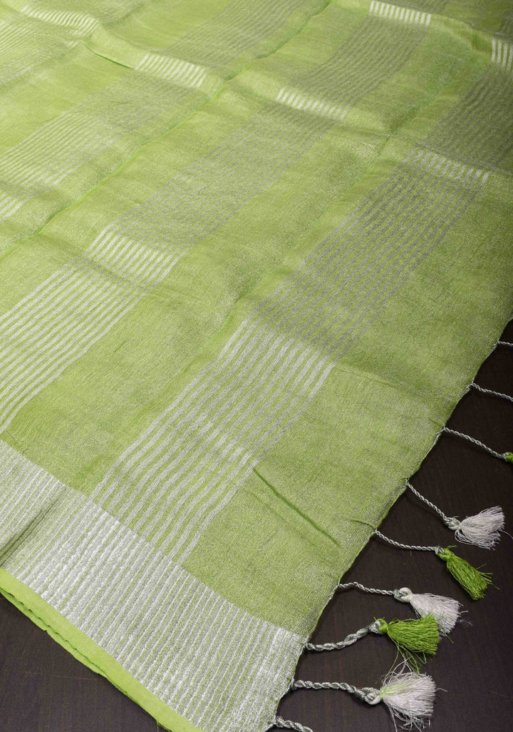 Parrot Green Linen Saree with Parijaat Flower Embroidery  | Shobitam saree