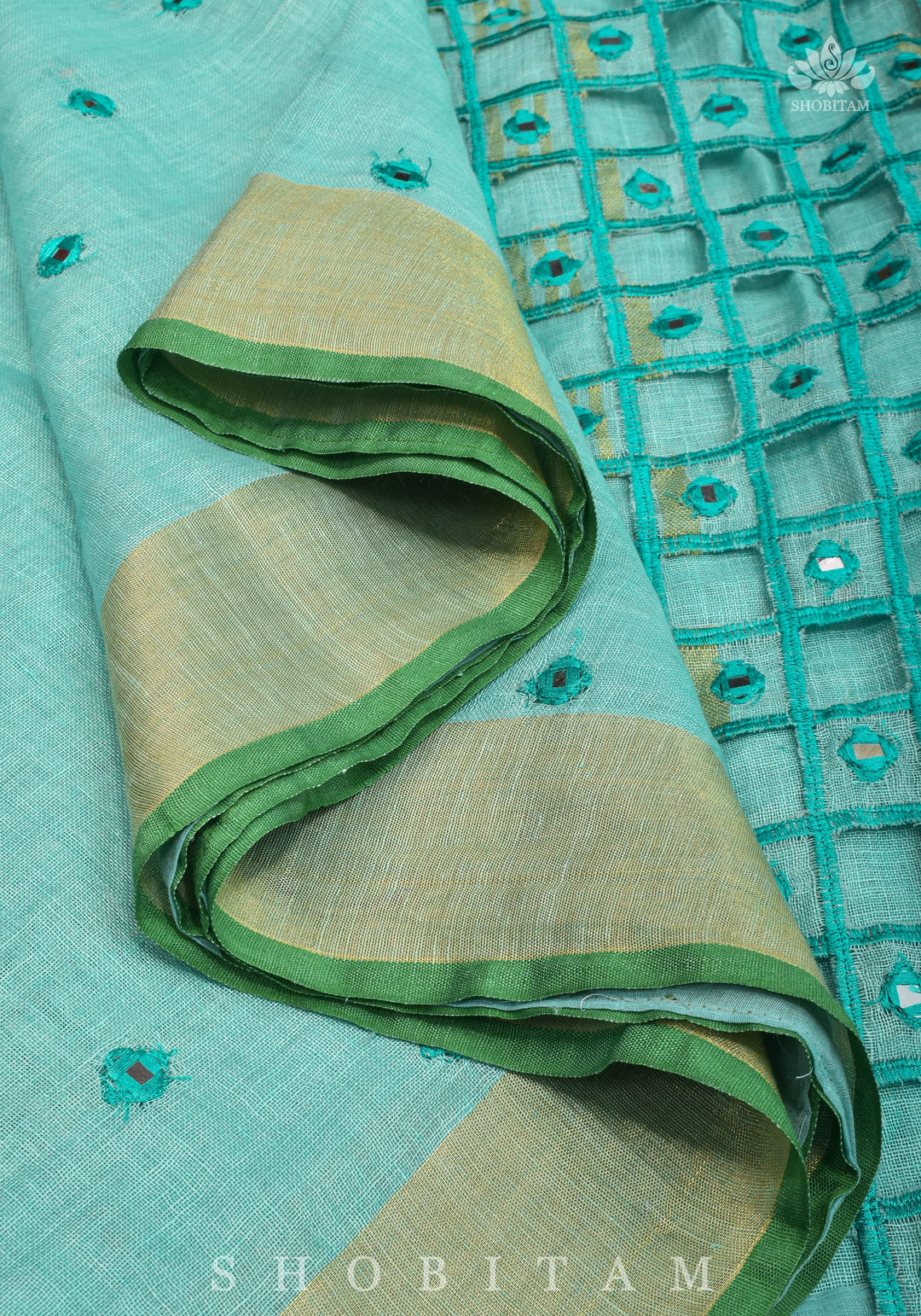 Jaali Pallu - Cutwork and Mirrorwork Saree in Linen by Linen in Teal Color | SHOBITAM